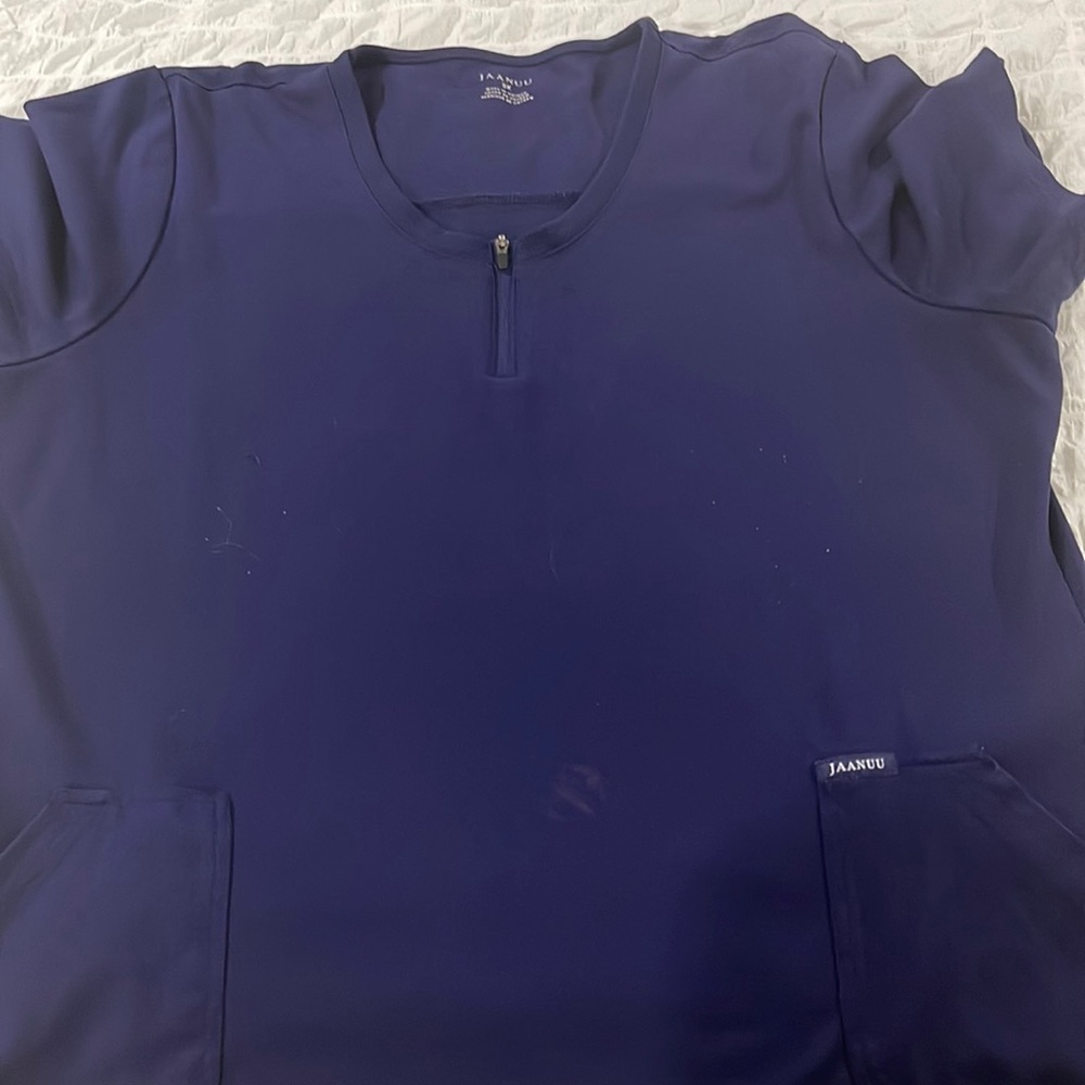 Jaanuu womens crew neck 2 pocket top